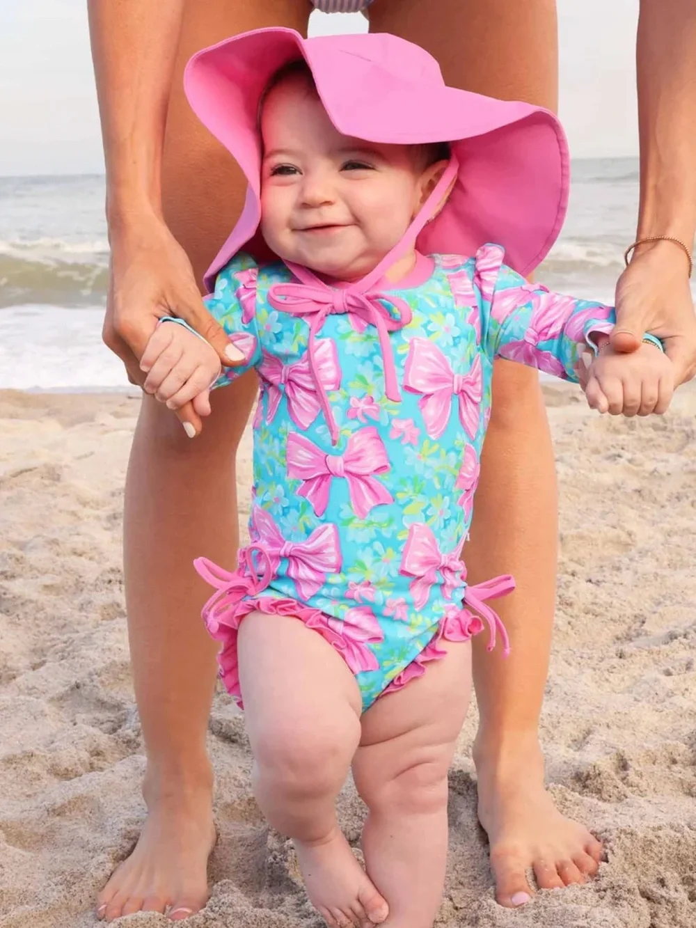 Caden Lane Toddler Girls Bow Print Long Sleeve Rash Guard Ruffle Bottom Swimsuit - Picture 2 of 7